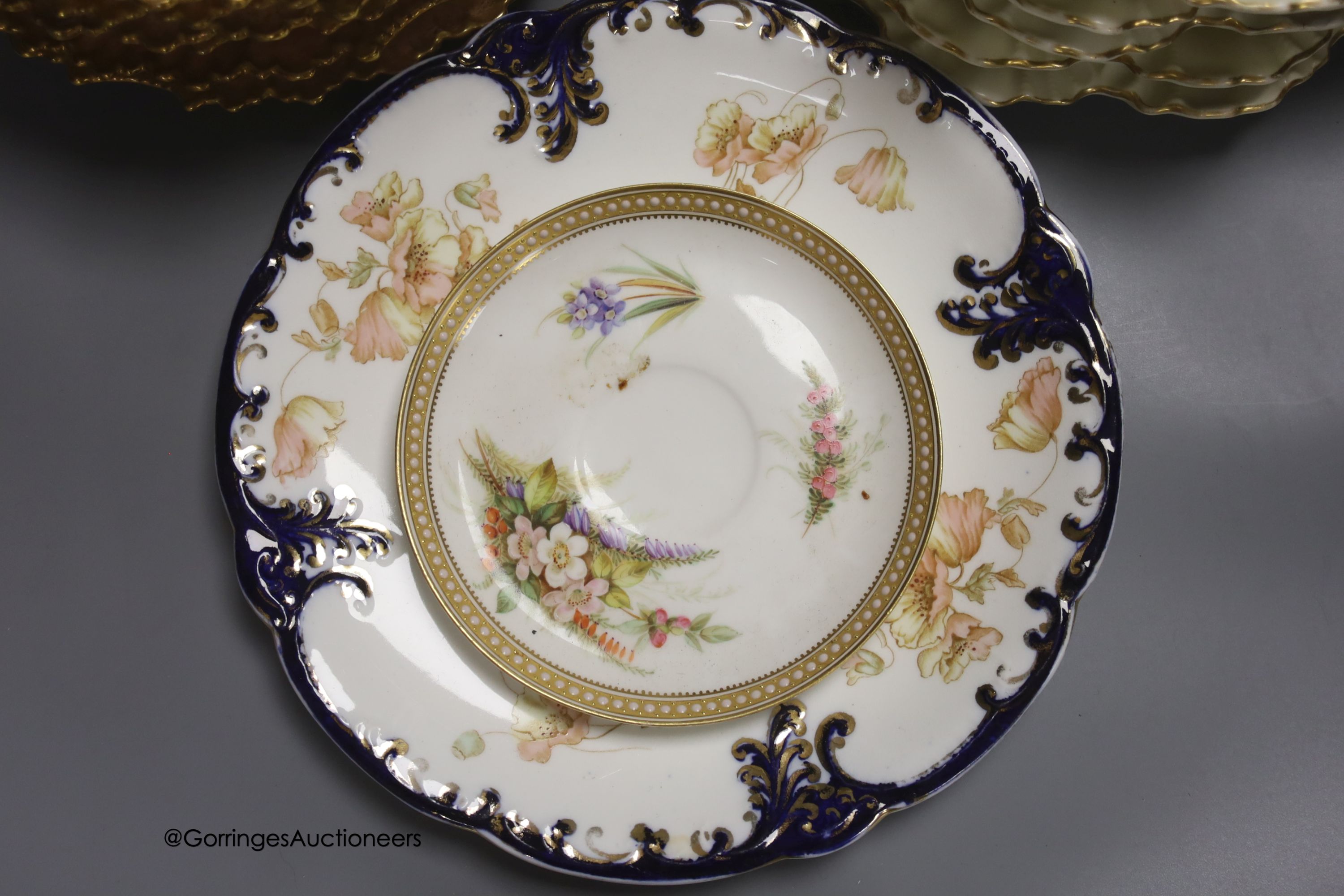 Two sets of six Limoges dessert plates, three English porcelain ribbon plates, an Alfred Pearce Aynsley dessert plate and a Worcester cup and saucer